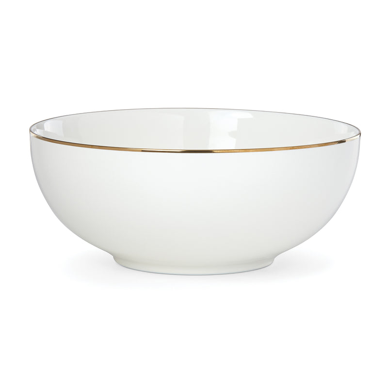 White porcelain serving bowl with thin gold rim and glossy finish