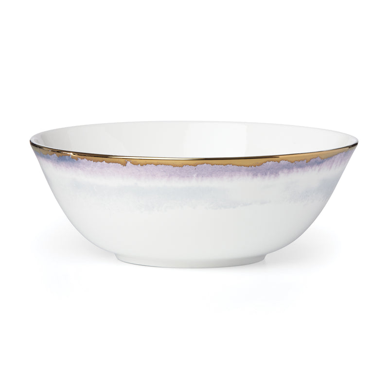 White porcelain serving bowl with soft purple wash and gold rim