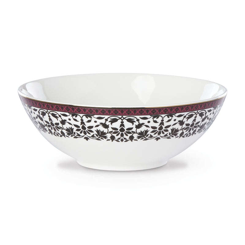 White porcelain serving bowl with black floral band and garnet diamond trim