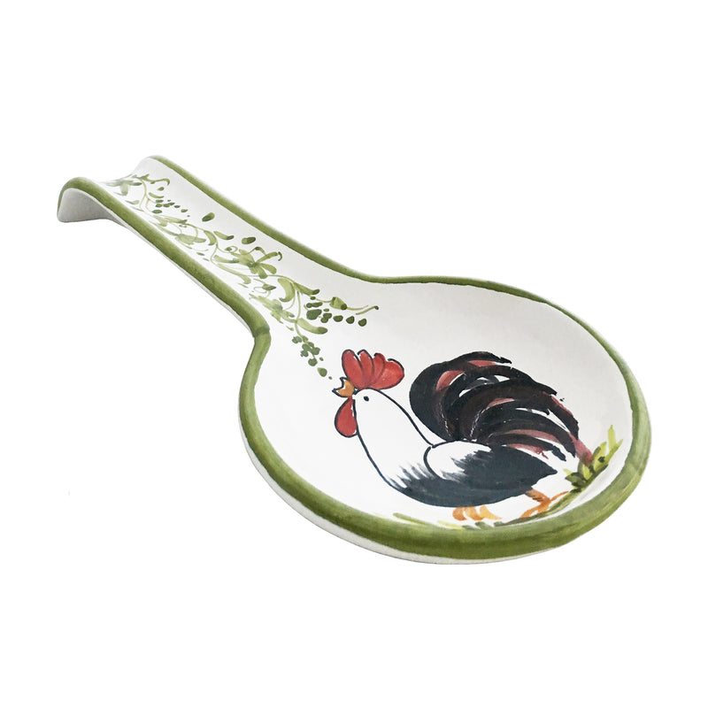Ceramic spoon rest with rooster illustration and green rim