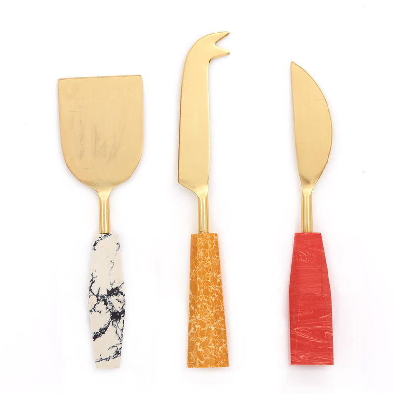 Charlton set of three cheese knives with marble, orange, and red handles