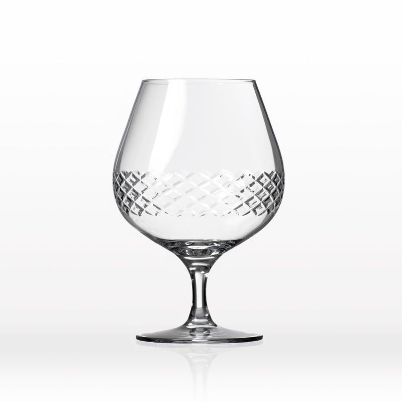 Brandy snifter glass with clear diamond-cut pattern and stem base