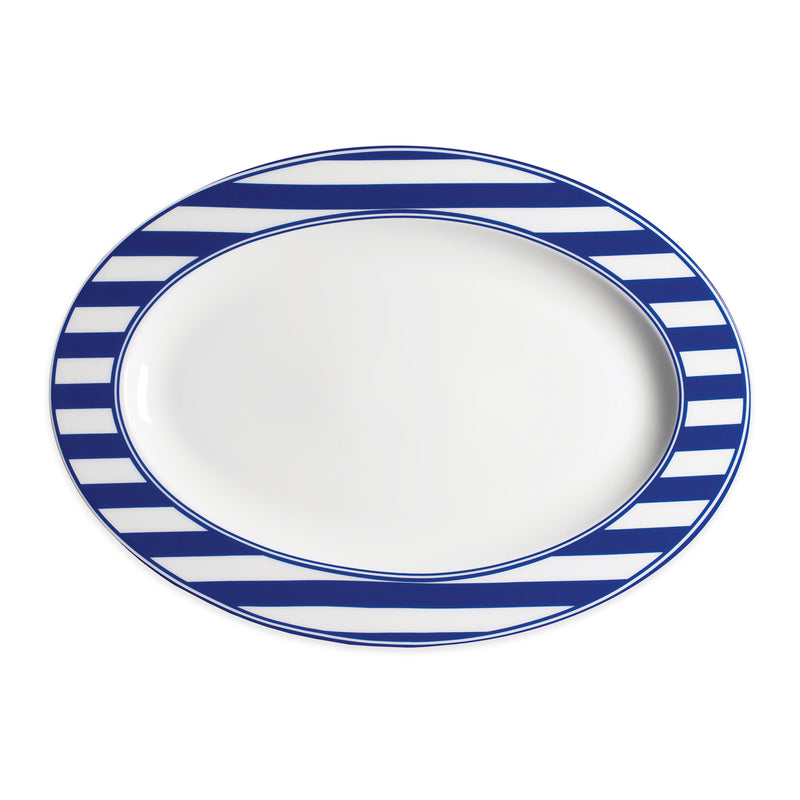 Porcelain oval platter with blue and white striped border and off-white center