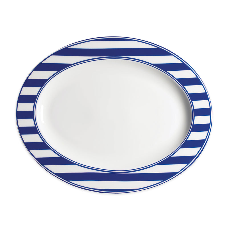 Porcelain oval platter with blue-and-white striped border and inner rim
