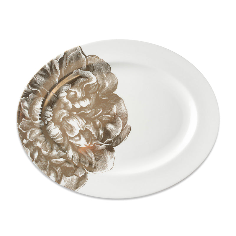 Caskata porcelain oval platter with gold floral design on a white base