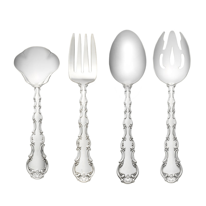 Sterling silver assorted serving utensils with ornate scrolling handles