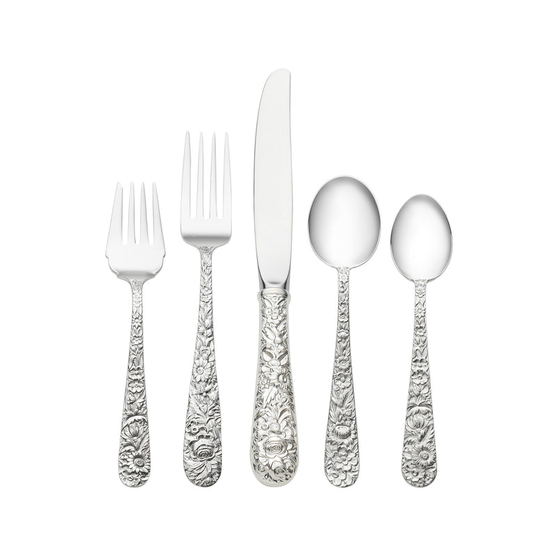 Repousse sterling silver 5-piece place setting with fork, knife, and two spoons