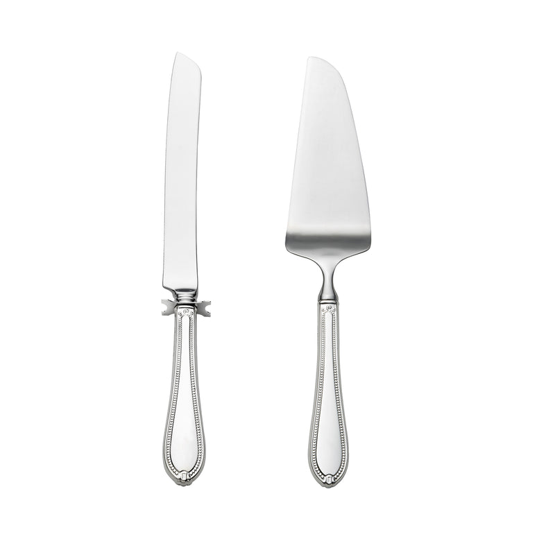 Sterling silver dessert serving utensils with fluted handles and pointed blades