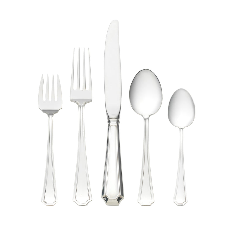 Sterling silver flatware set pieces with polished handles and pointed ends