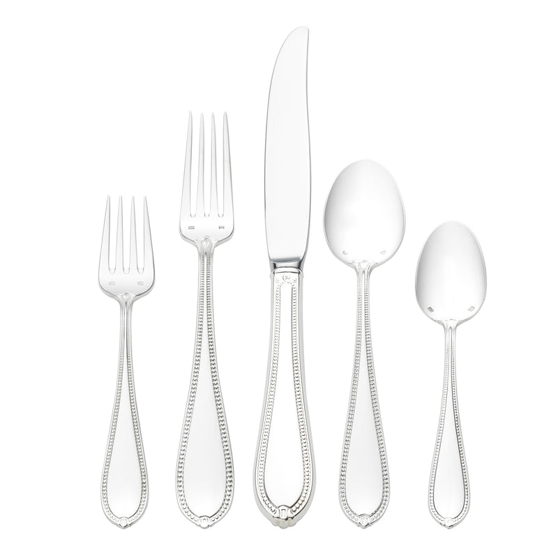 Sterling silver flatware place setting, assorted forks, spoon, and knife with ornate handles