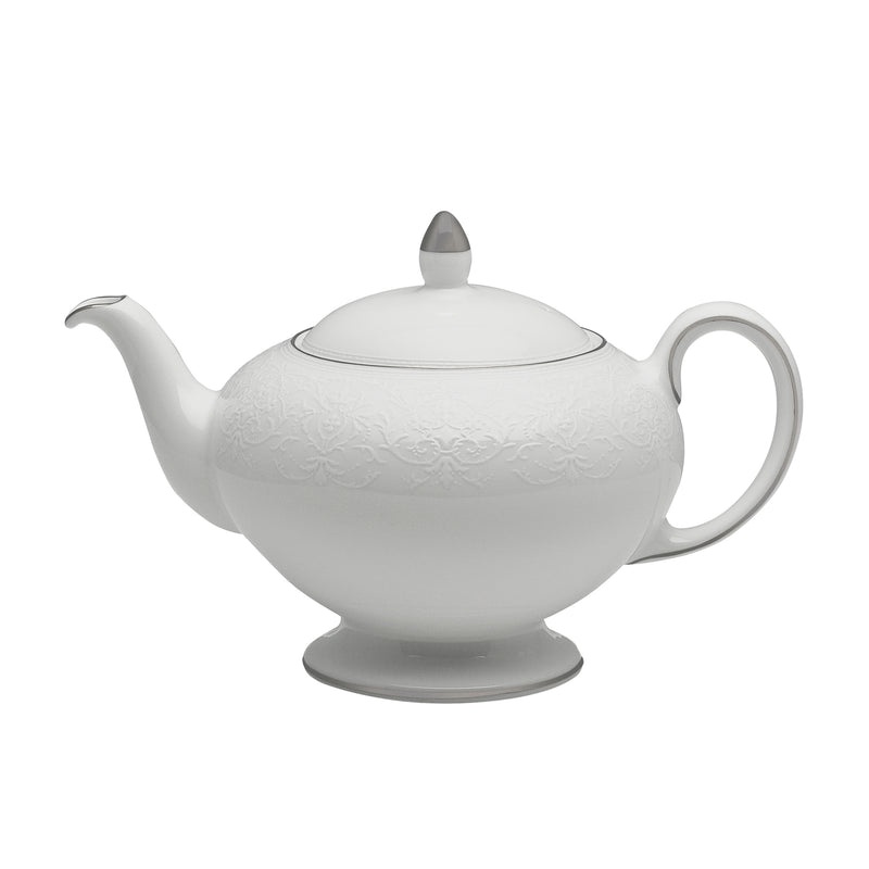 Wedgwood English Lace porcelain teapot, white with raised lace pattern and curved handle