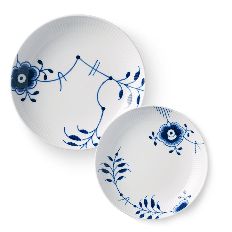 Pair of blue-and-white porcelain shallow bowls with fluted blue floral pattern