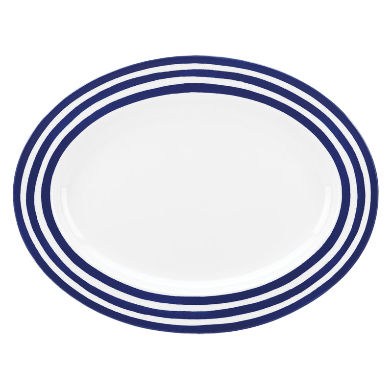 Blue oval platter with concentric white and dark blue stripe border