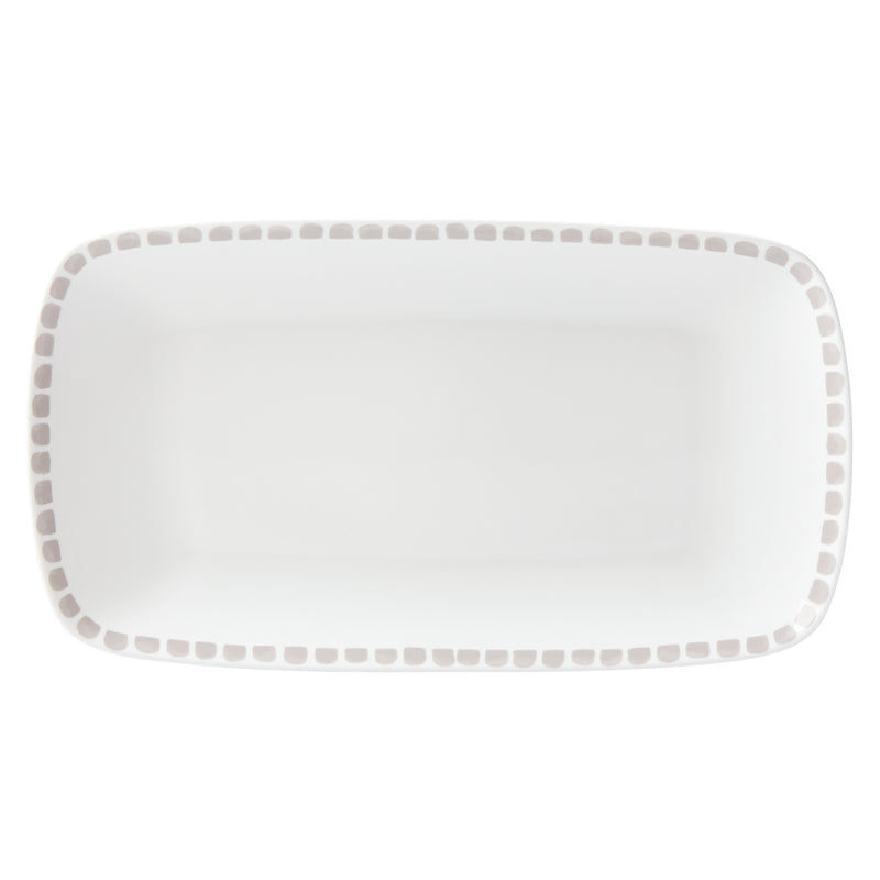 Gray ceramic serving tray with dotted border around a rectangular platter