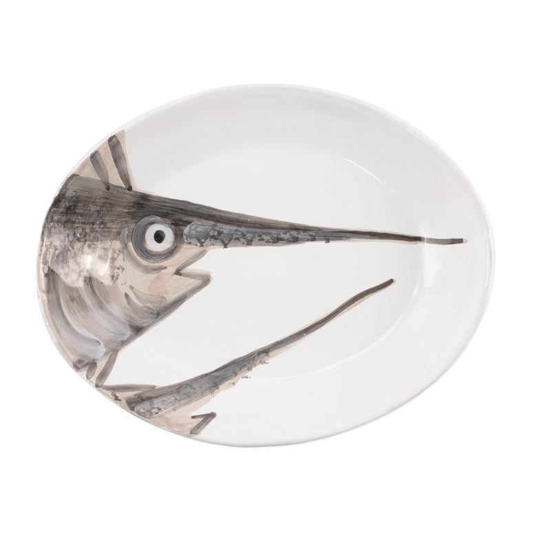 White oval serving bowl with painted swordfish design in gray