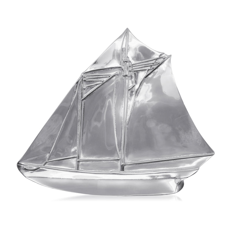 Silver sailboat-shaped decorative platter with raised sail details