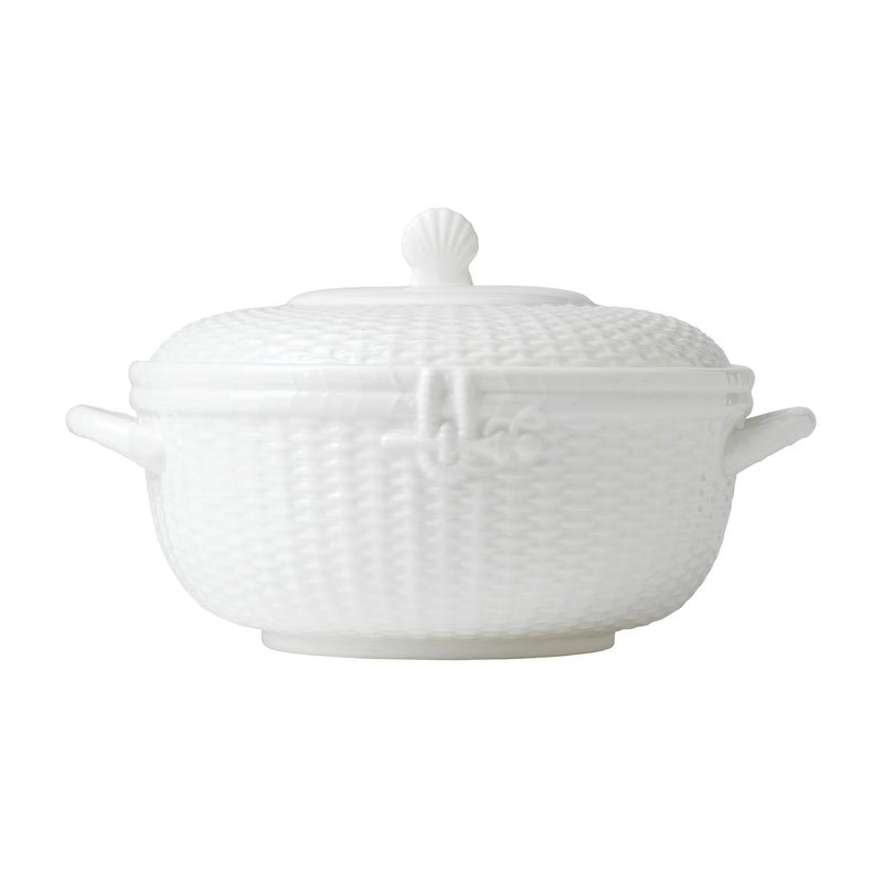 White ceramic covered vegetable bowl with basket-weave texture and knob lid