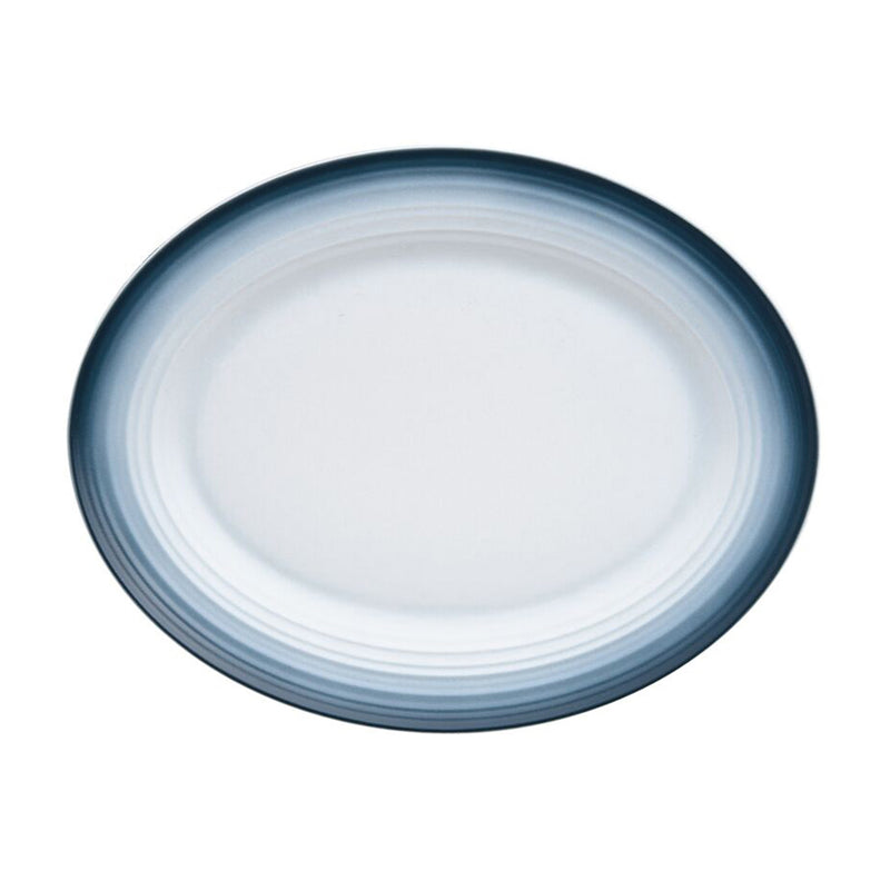 Mikasa Swirl ombre blue oval platter with dark blue rim and light swirl lines