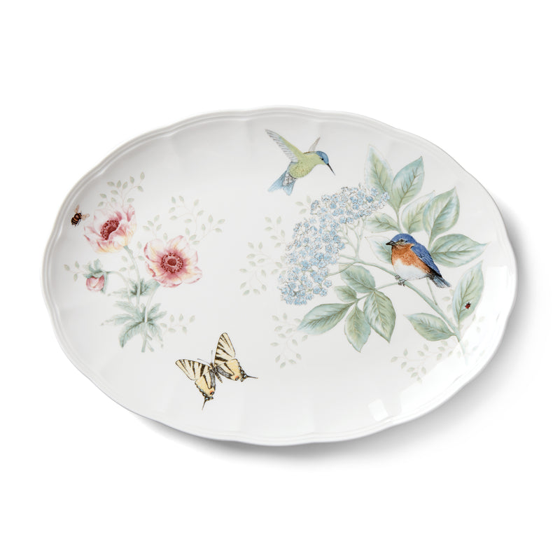 Porcelain oval platter with floral butterfly and bluebird meadow design