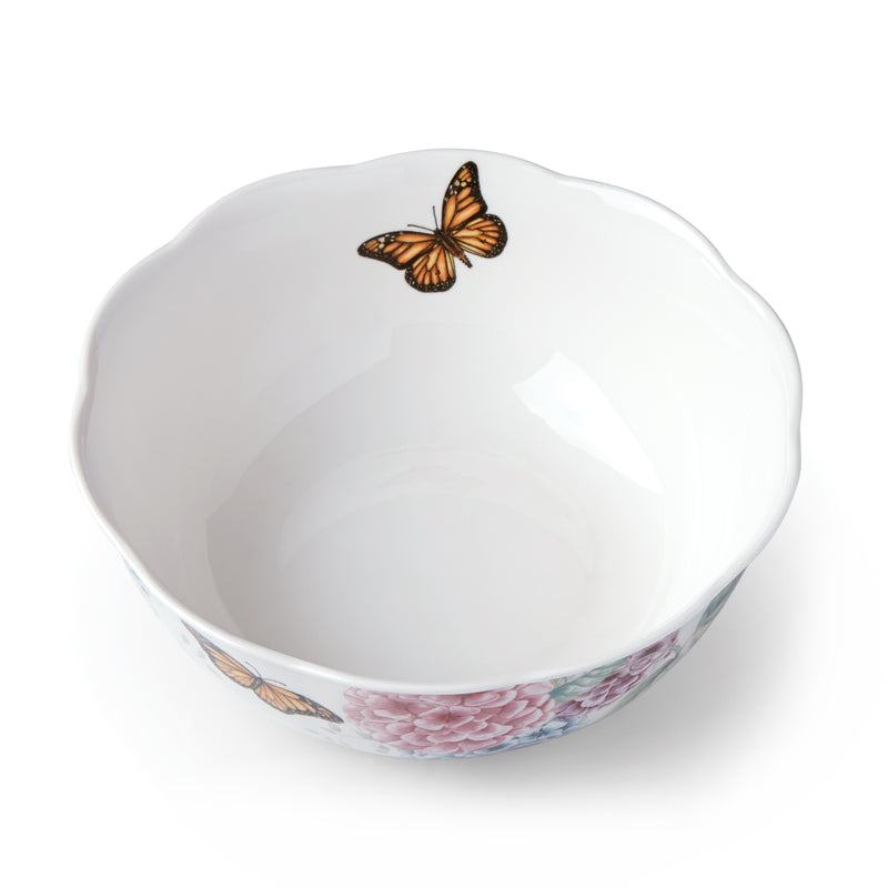 Lenox porcelain serving bowl with white interior, butterfly motif, hydrangea floral rim