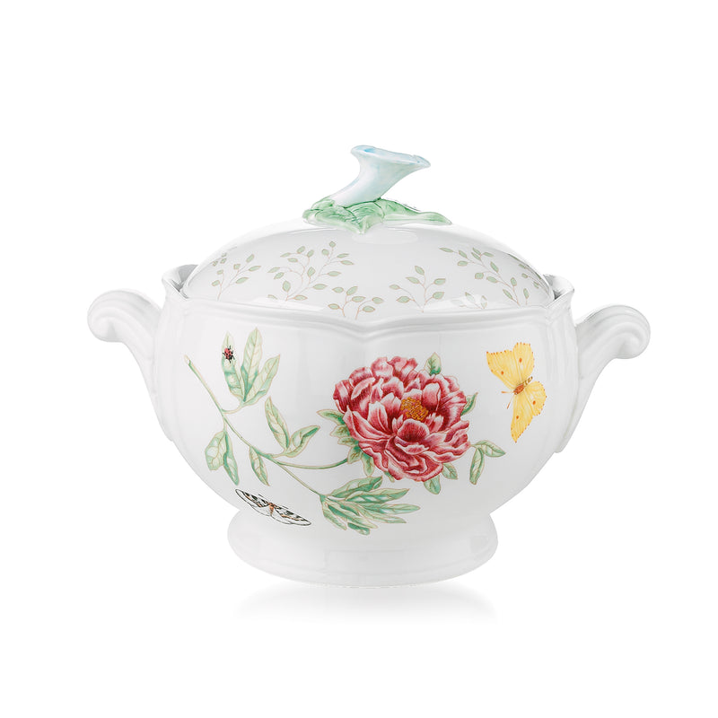 Porcelain covered casserole dish in white with pink rose and green botanical pattern