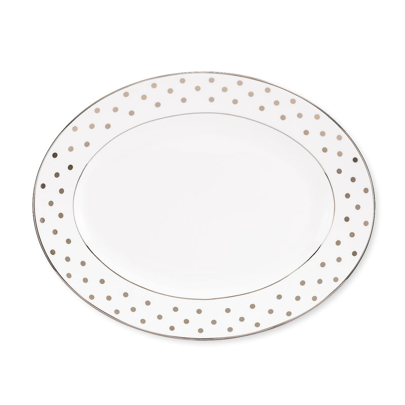 Platinum oval platter with white center and gold dot border around the rim
