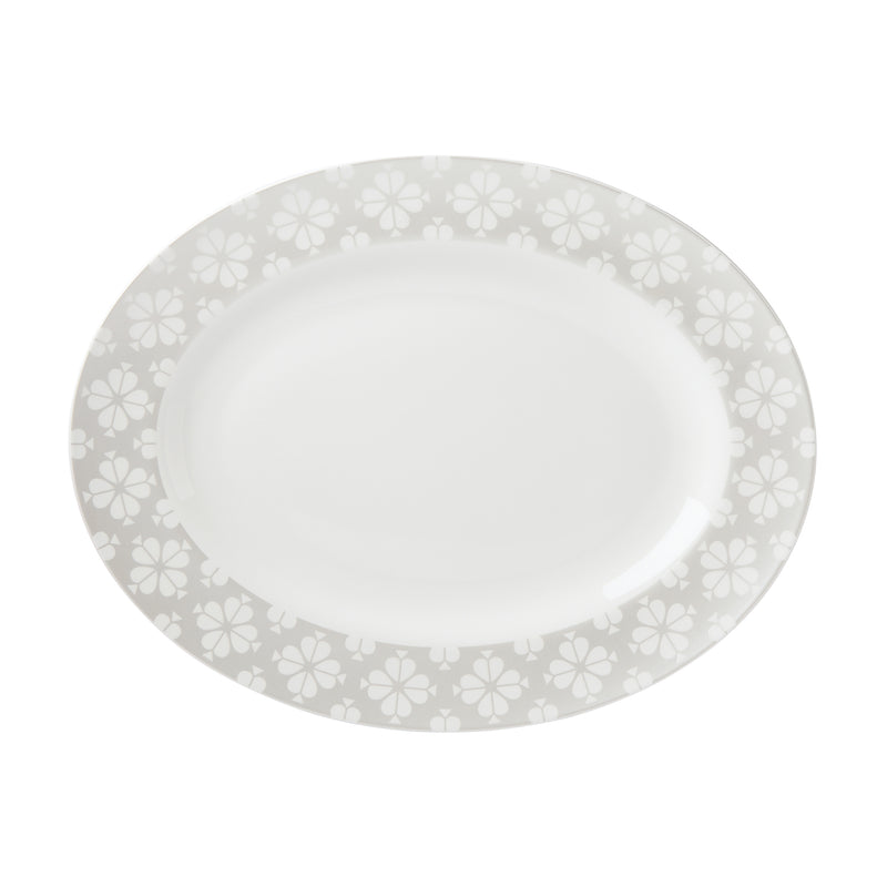 Oval ceramic platter with light gray floral border and glossy white interior