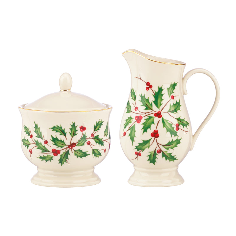 Lenox porcelain lidded sugar bowl and creamer with holly berry pattern and gold trim