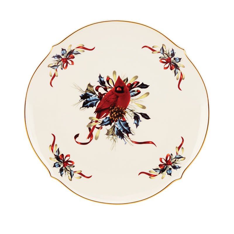 Round ceramic platter with gold rim and red-blue poinsettia floral design