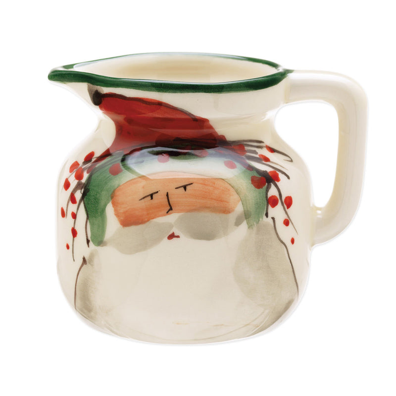 Vietri Old St. Nick cream ceramic creamer jug with green rim and Santa face design