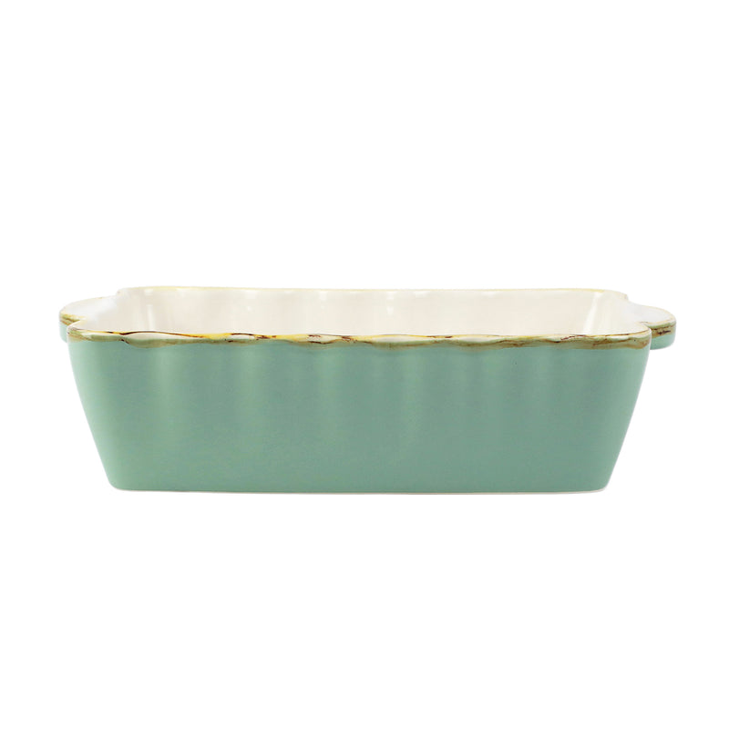 Small rectangular ceramic baker, aqua glaze with white rim and gold edge trim