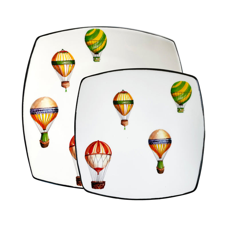Ceramic square plate with colorful hot air balloon illustration, white with dark rim.