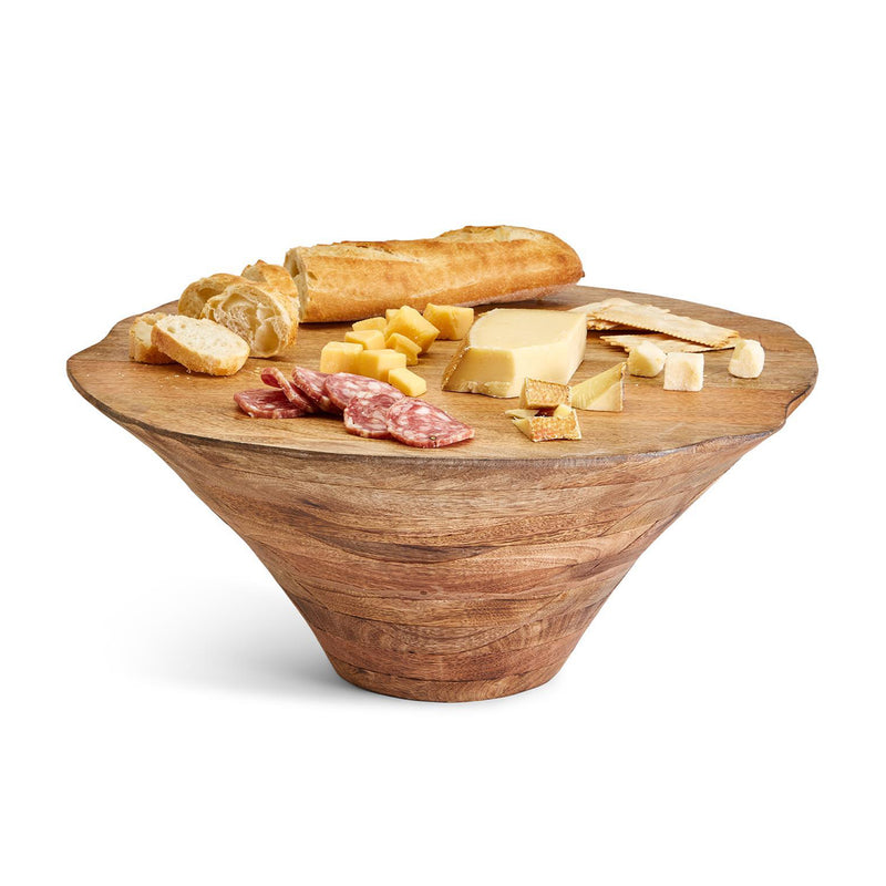 Round carved mango wood centerpiece bowl with assorted bread and cheese on top