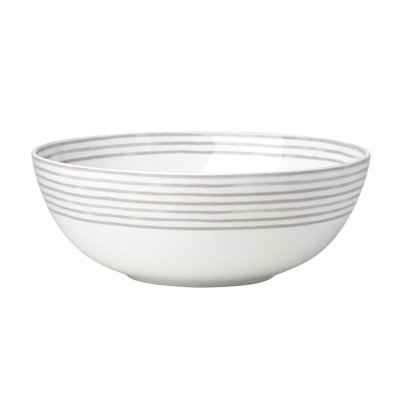 Porcelain serving bowl with white base and gray horizontal stripe pattern