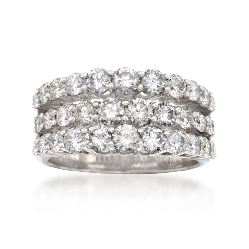 18kt white gold diamond wedding band with three rows of round stones