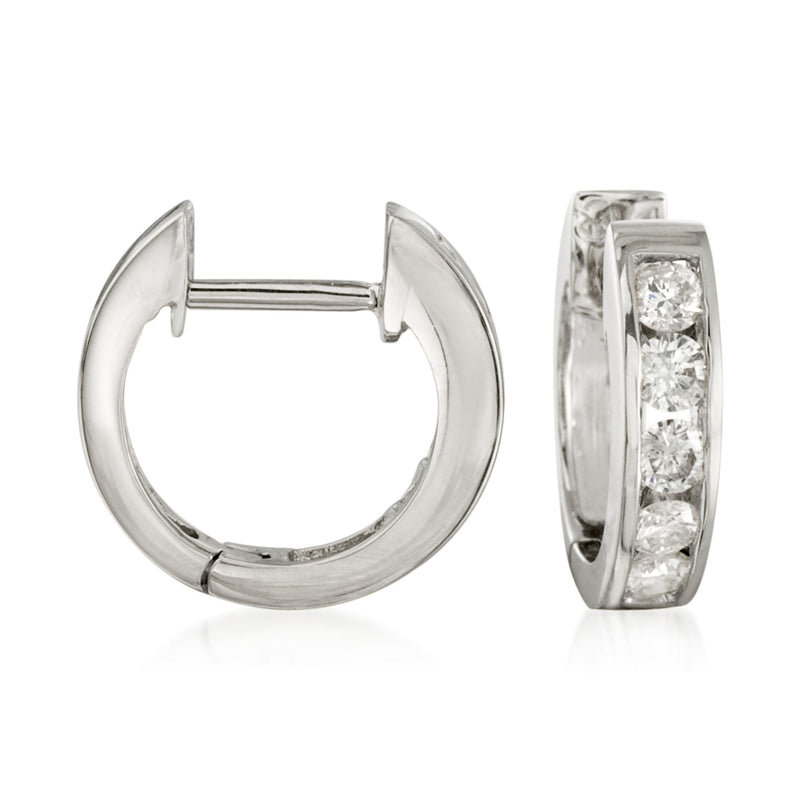 14kt white gold hoop earrings with three round diamonds in channel settings