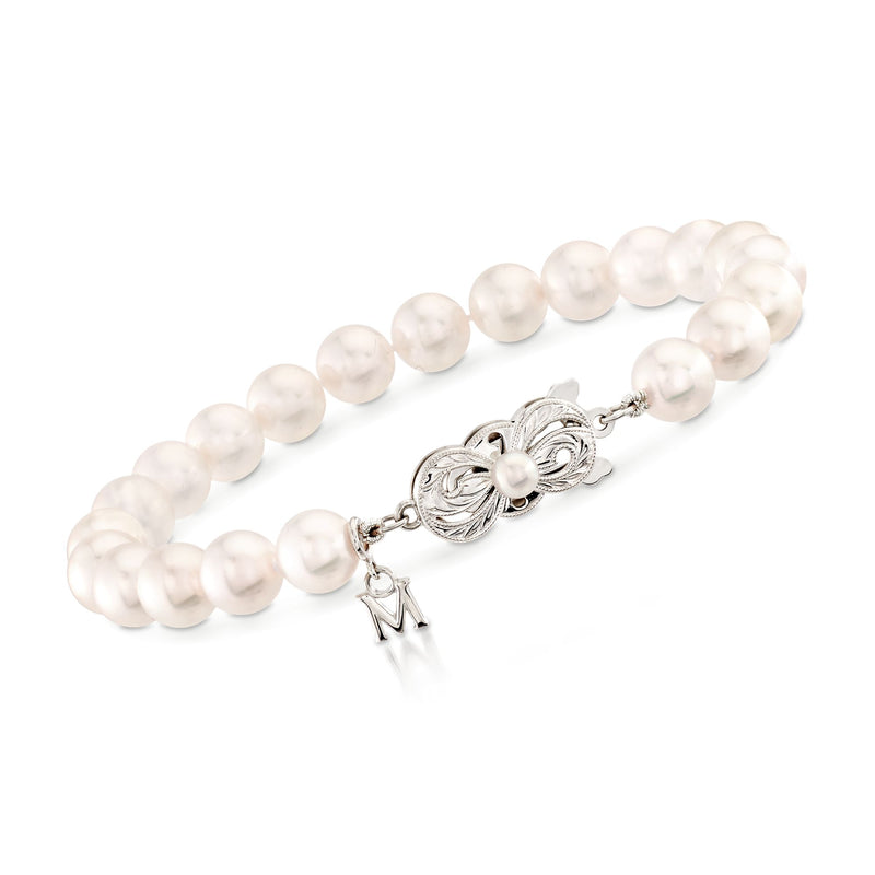 Akoya pearl bracelet, 7–7.5mm pearls, 18kt white gold clasp and dangling M charm
