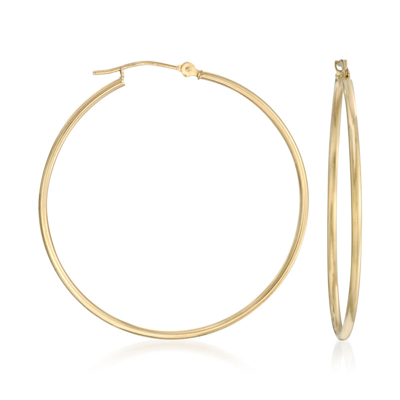 Large 14kt yellow gold hoop earrings with hinged closure