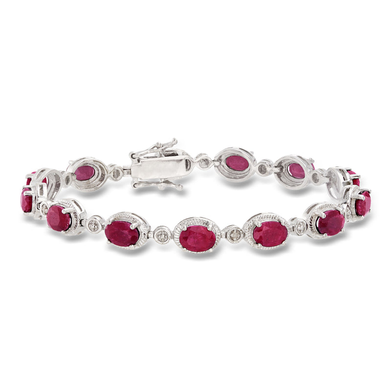 Ruby and diamond bracelet in sterling silver with oval ruby stations and round accents