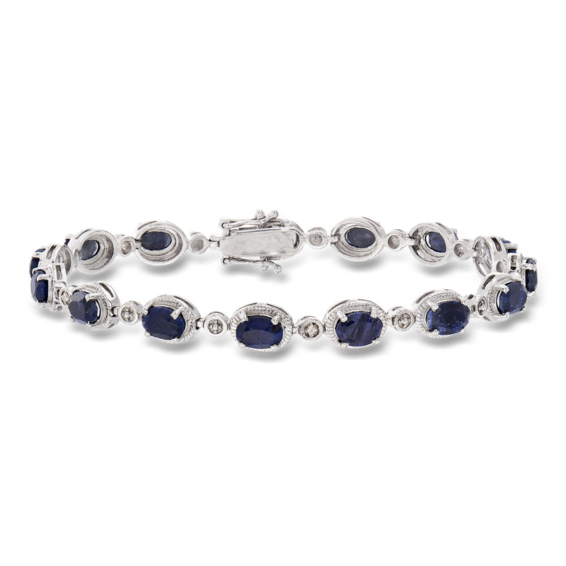 Sterling silver sapphire tennis bracelet with oval blue stones and diamond accents