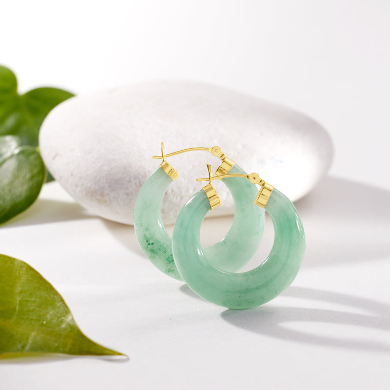 Jade hoop earrings with hinged backs and yellow gold posts