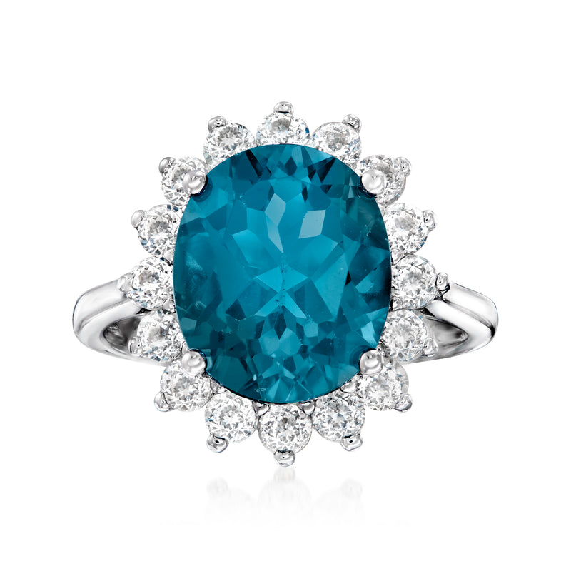 Sterling silver ring with oval London blue topaz center and white topaz halo