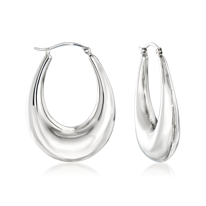 Graduated sterling silver hoop earrings with rounded hinged clasp, polished shine