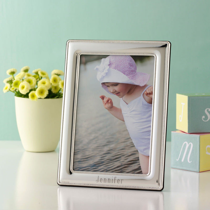 Sterling silver photo frame with double beaded edge and engraved “Jennifer”