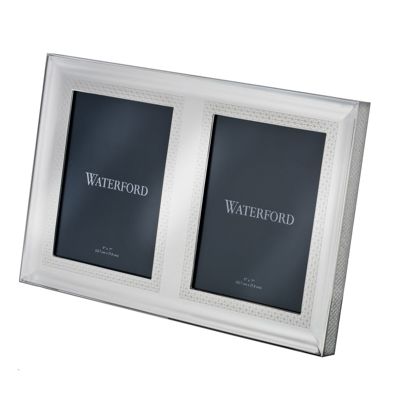 Silvertone double photo frame with two dark inserts and Waterford engraving