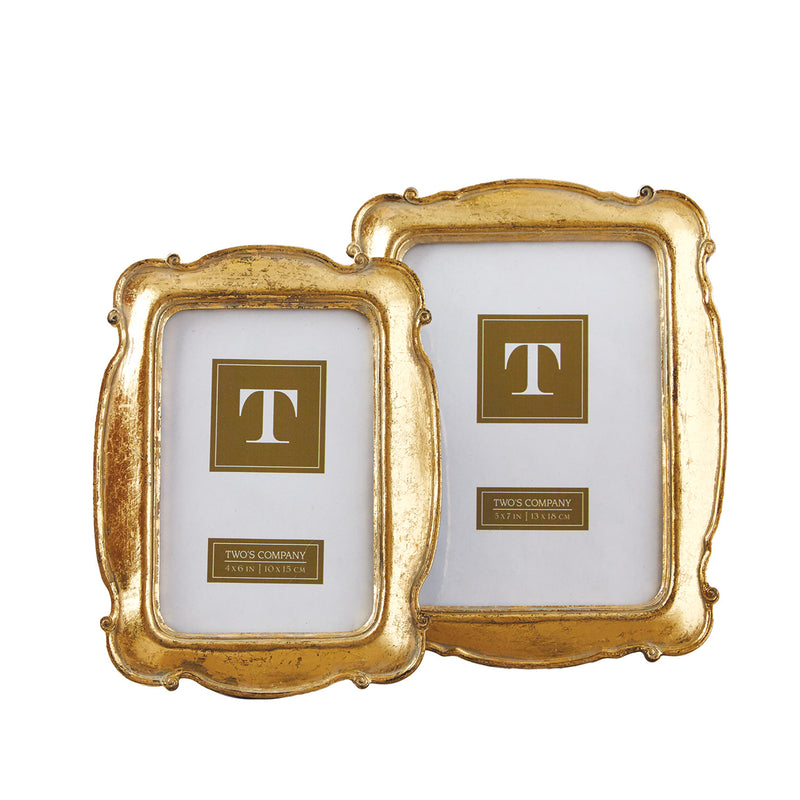 Set of two gold scalloped-edge picture frames with inner white photo mats