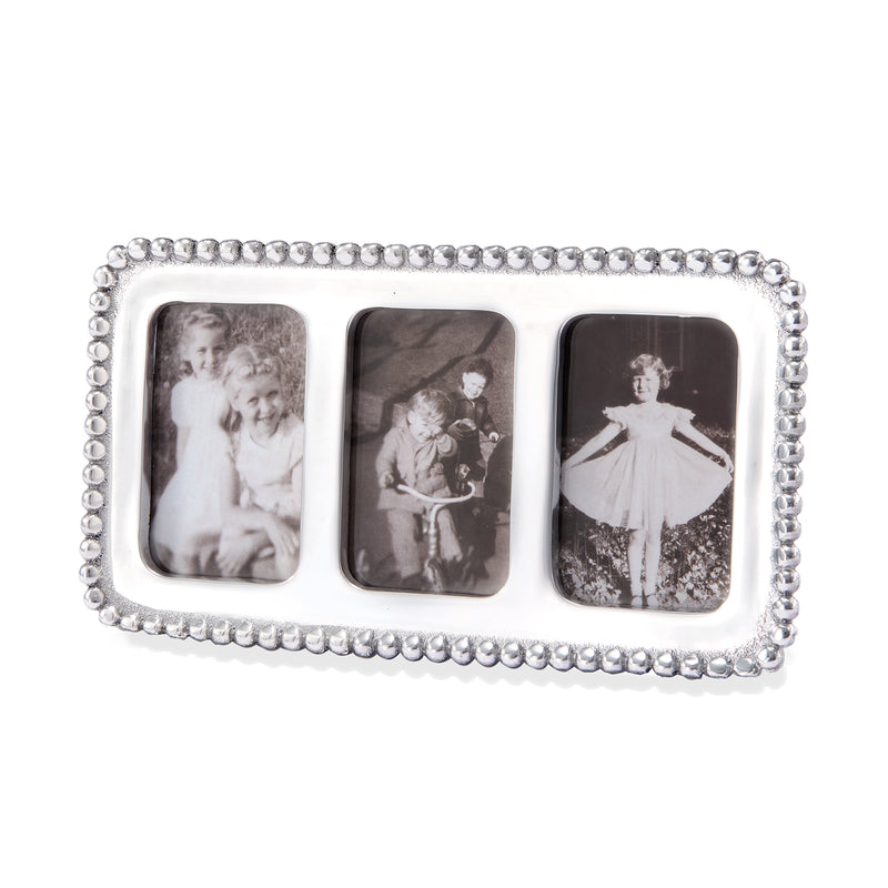 Beaded collage photo frame with silver beaded border and 3 portrait photo openings