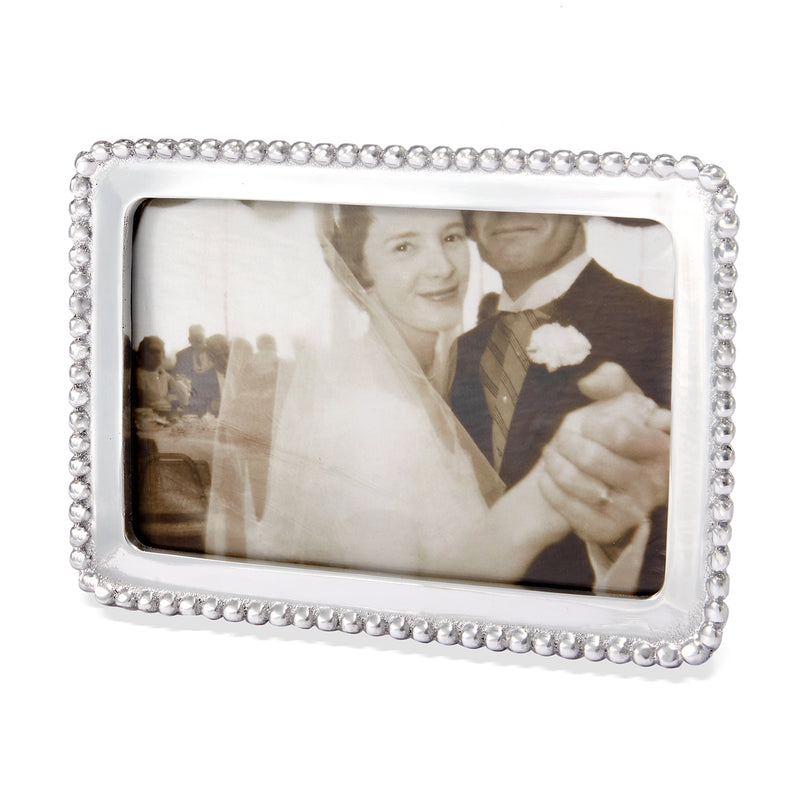 Silver beaded photo frame with rectangular opening and clear beaded trim