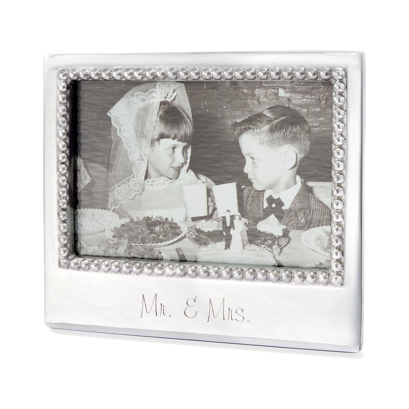 White 4x6 photo frame with silver rhinestone border and Mr. & Mrs. engraving