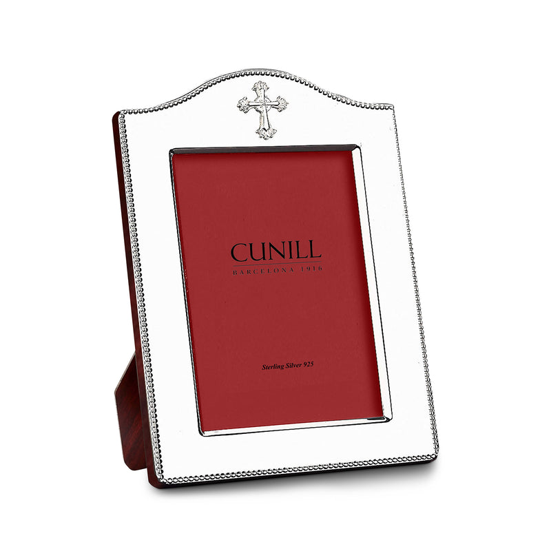 Sterling silver picture frame with beaded border and small cross at top, holds 4x6 photo